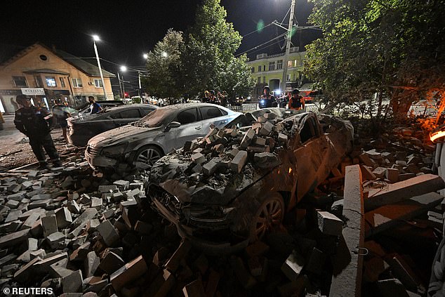 A car crushed by the rubble of a destroyed building in Kryvyi Rih, central Ukraine