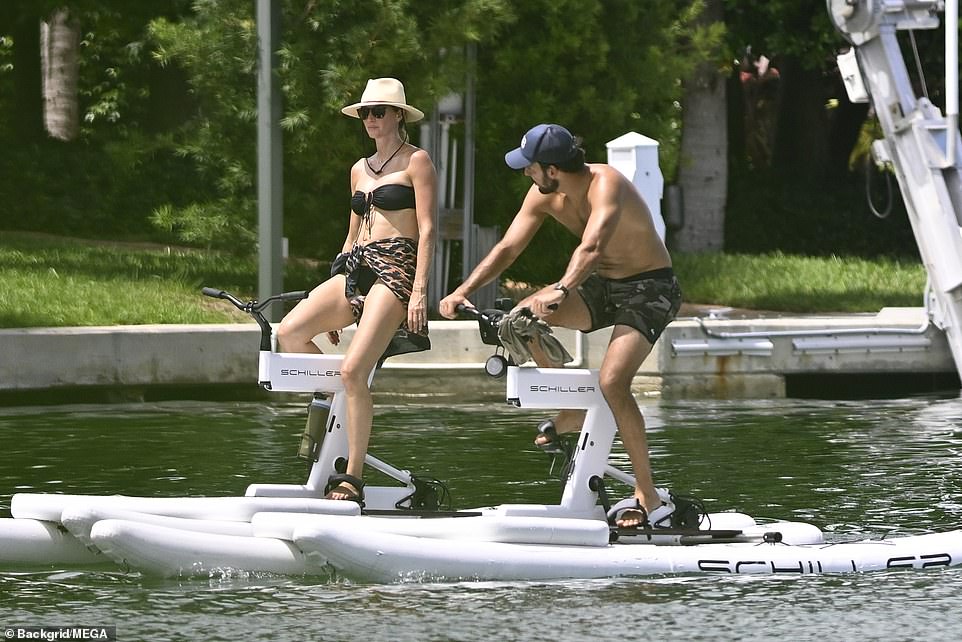 The Versace model and martial arts expert were having fun in the water in South Florida at the end of summer.