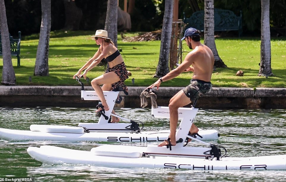 They were spotted showing off their fit physiques as they enjoyed a relaxing ride on some Schiller water bikes near their Miami Beach home.