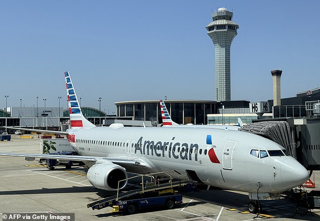 In recent years, there has been a marked increase in the number of reported sexual assaults on board flights. (Pictured, an American Airlines Boeing 737-823 passenger jet sits at a gate at Chicago's O'Hare Airport.)