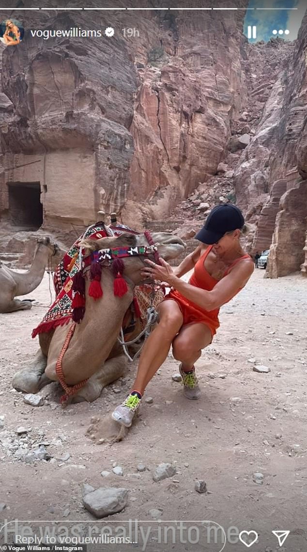 The camel decided to nuzzle her face, causing Vogue to gasp in surprise. She joked: 