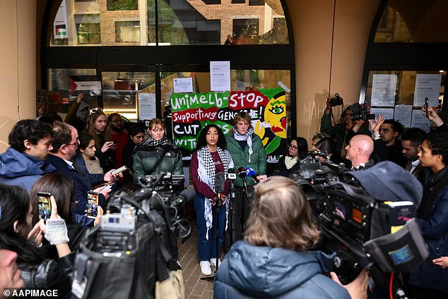 Pictured: Melbourne University students speaking at a press conference during a pro-Palestine protest.