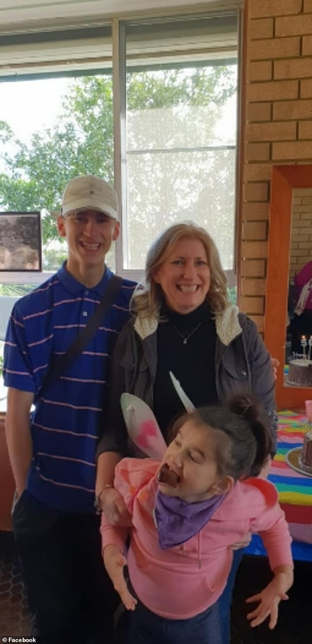 Christopher Carrig (left) with his mother Jennifer and sister Ella about seven years ago, he was accused of painting Nazi graffiti and arrested eight days before the tragic deaths of his sister and mother.