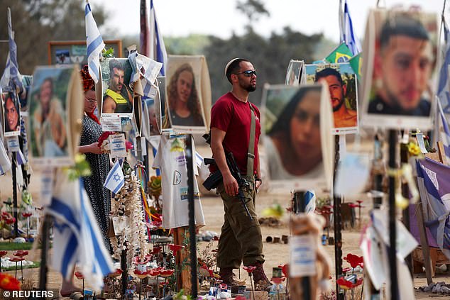 A man walks at the Nova festival site, where partygoers were killed and abducted during the Oct. 7 attack by Hamas.