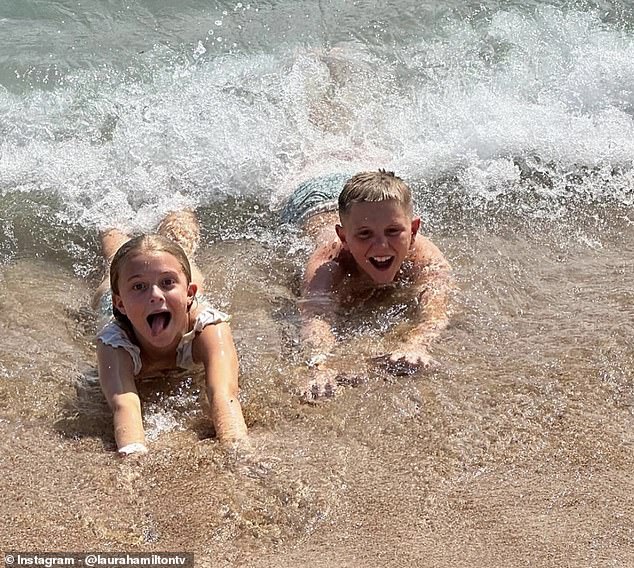 The A Place In The Sun presenter and her son Rocco, 9 (right) and daughter Tahlia, 6 (left) have been making the most of their sunny holiday.