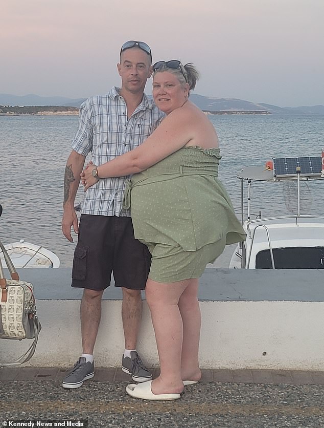 Stuart and Zoe Doyle are pictured together on holiday when Zoe was unknowingly seven months pregnant.