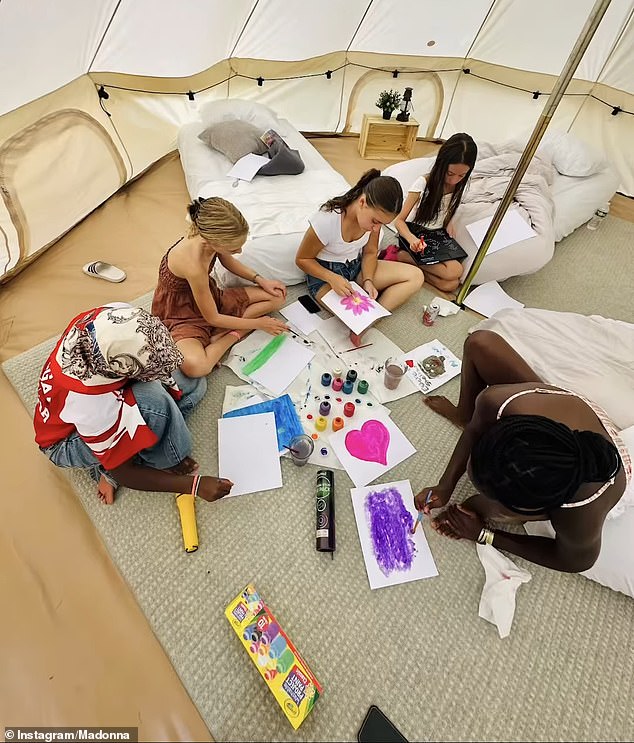 Young girls made crafts inside luxurious tents.