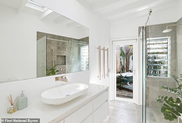 The couple carried out a number of major renovations to the property, including the addition of an extension and a guest apartment. Pictured: the master bedroom's en-suite bathroom