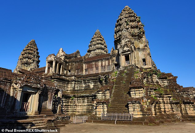 Tourists have filmed themselves running through the ancient Cambodian temple (pictured)