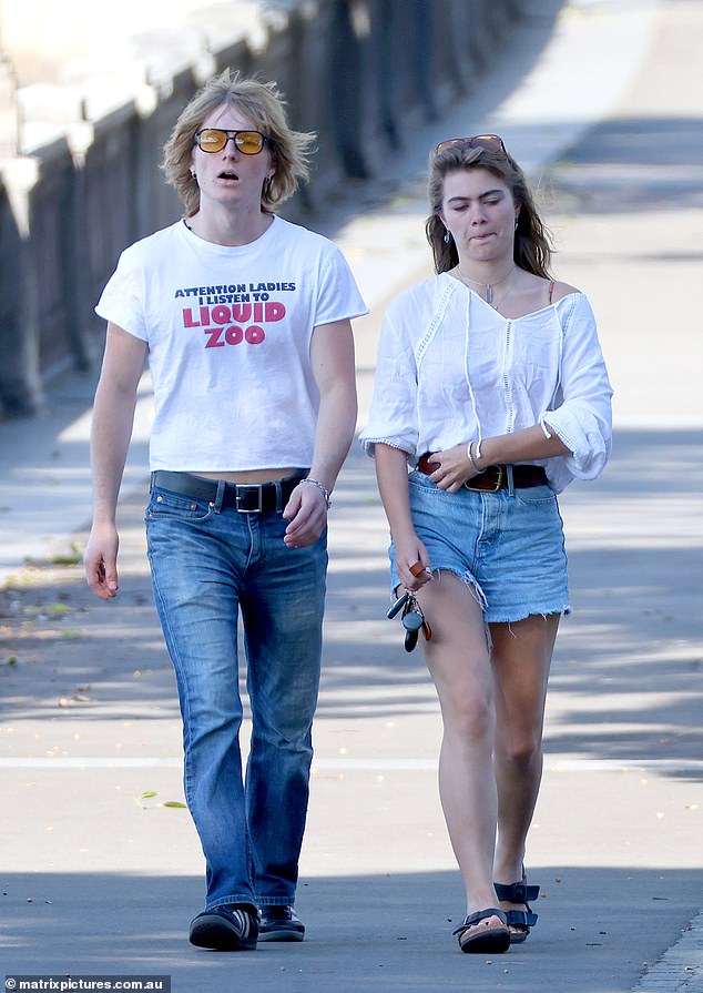 She also put on a pair of comfortable black sandals and at one point covered herself with a flowing white shirt.