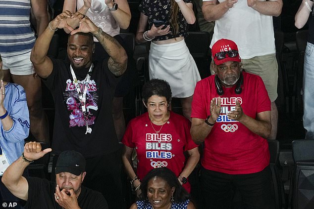 Her husband, Jonathan Owens, her mother, Nellie, and her father, Ron, cheered her on in Paris.