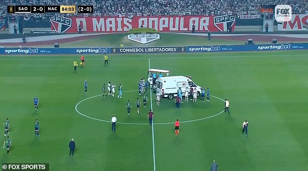 The ambulance rushed straight onto the pitch to reach the collapsed player.