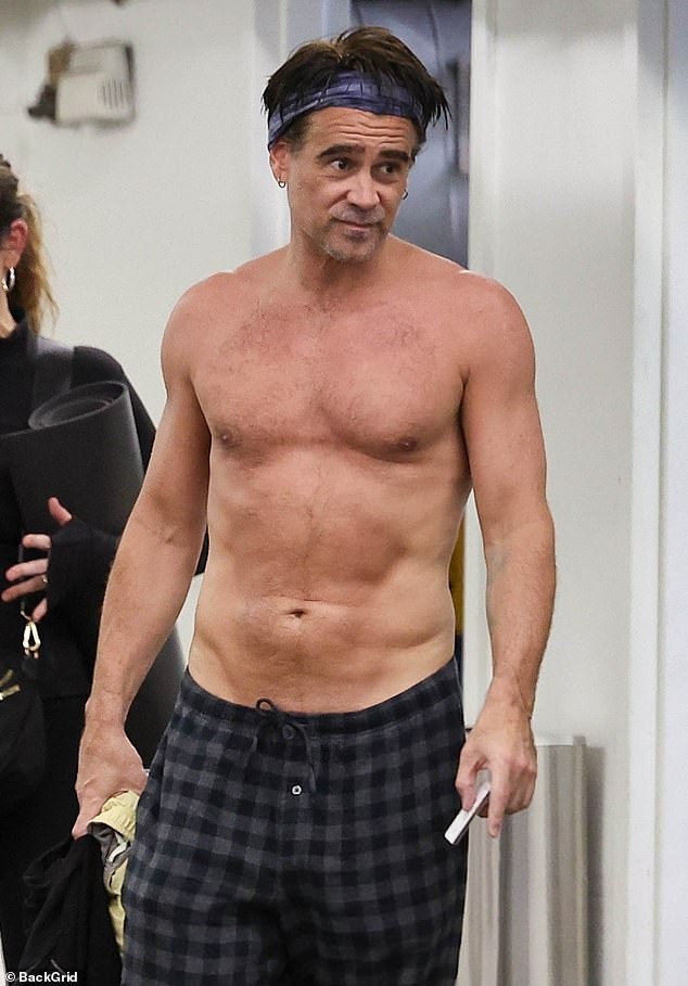 The Irish-born actor opted to take off his shirt as he made his way through a parking lot and changed into a pair of black and grey plaid pajama pants.