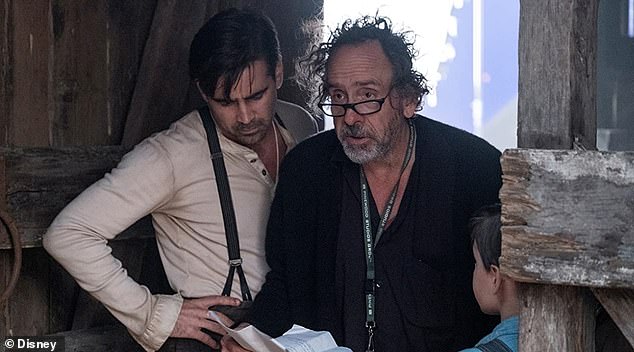 Keaton starred alongside Danny DeVito as Max Medici and Colin Farrell as Holt Farrier; (Farrell and Burton on the set of Dumbo)