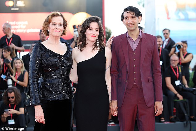 Shar posed in the center, with her mother to her right and filmmaker Nemo Allen to her left.