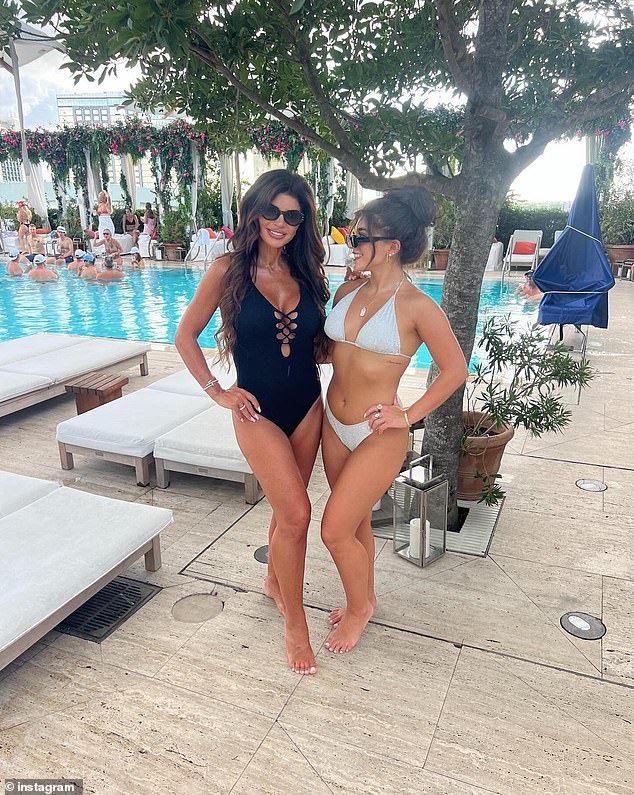 The mother and daughter posed beautifully in swimsuits while enjoying a day at the pool at a Tampa-area hotel.