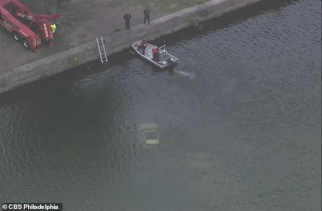 Both the man and woman managed to escape the car before it sank underwater, but they had to swim back to dry land in a very embarrassing manner.