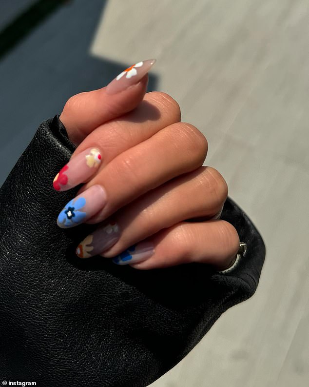 The carousel continued with a photo of her nails.