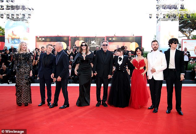 The cast of Beetlejuice Beetlejuice descend on the carpet (pictured, from left: Catherine O'Hara, Willem Dafoe, Michael Keaton, Monica Belluci, Tim Burton, Winona Ryder, Jenna Ortega, Justin Theroux and Arthur Conti)