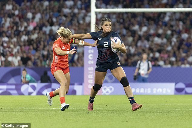 Maher defends Emma Uren #7 of the Great Britain Women's National Team during the Paris games