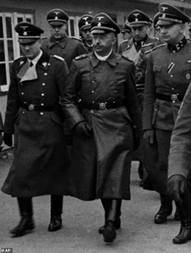 Heinrich Himmler (center) at Stutthof, the first Nazi camp outside Germany