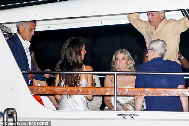 The couple went out on a boat with the businessman to dine at the five-star Villa Passalacqua hotel.