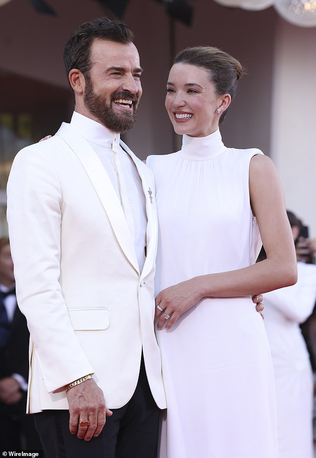 She was seen sporting a dazzling diamond ring on her left hand on the red carpet as they made a loving appearance at the Beetlejuice premiere during the Venice Film Festival on Thursday.