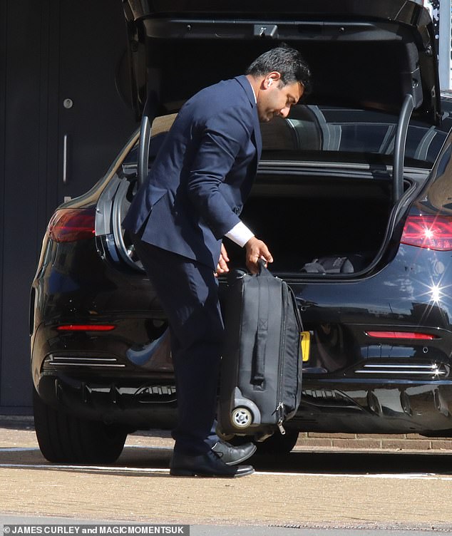 He also took a suitcase to the studio.