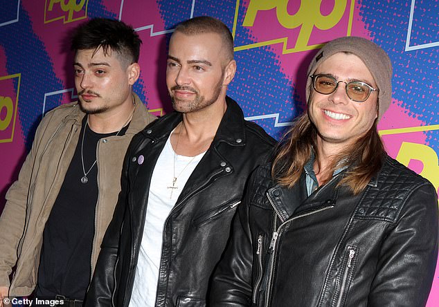 Joey, center, with his brothers Andrew, left, and Matthew, right, at the Hollywood premiere of Darlings in 2017