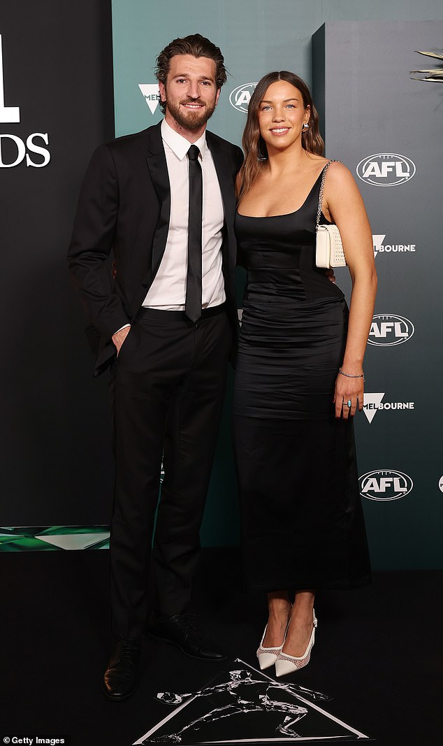 The 28-year-old, who arrived with partner Neila Brenning (right), took home the Leigh Matthews Trophy as AFL Players' Association MVP.