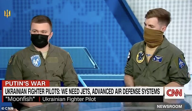 Ukrainian Lieutenant Colonel Oleksii Mes, 31, left, pictured speaking on US news channel CNN