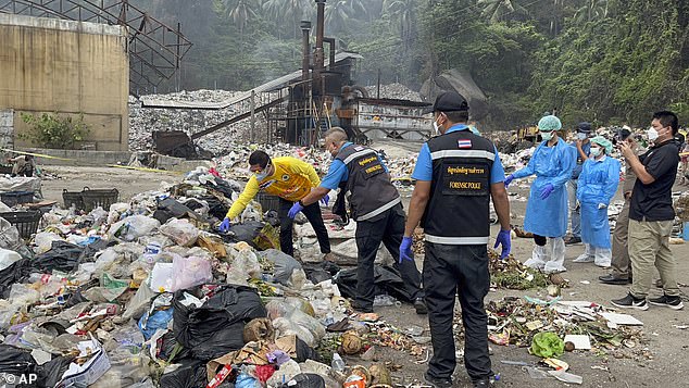 Thai police forensic officers investigate a garbage dump while searching for body parts of a Colombian surgeon on the island of Koh Phagnan. August 4, 2023