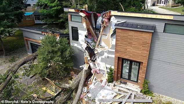 The footage was captured on Wednesday, August 28, a day after intense storms hit Michigan, destroying power lines and damaging homes and cars in their wake.