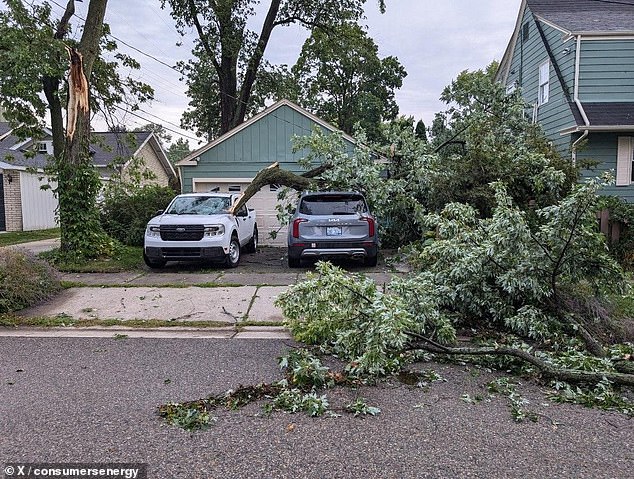 Nearly 400,000 people were left without power in Michigan amid extreme heat and severe storms