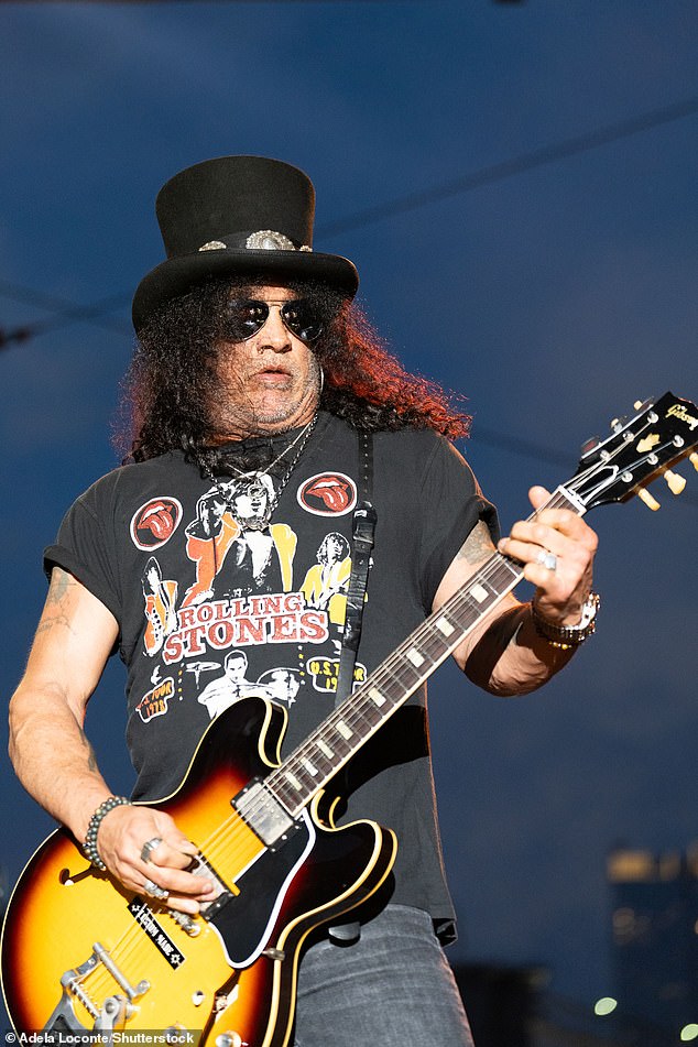 The November Rain singer wore a black Rolling Stones T-shirt with dark grey jeans and his signature top hat at the show in the Big Apple.