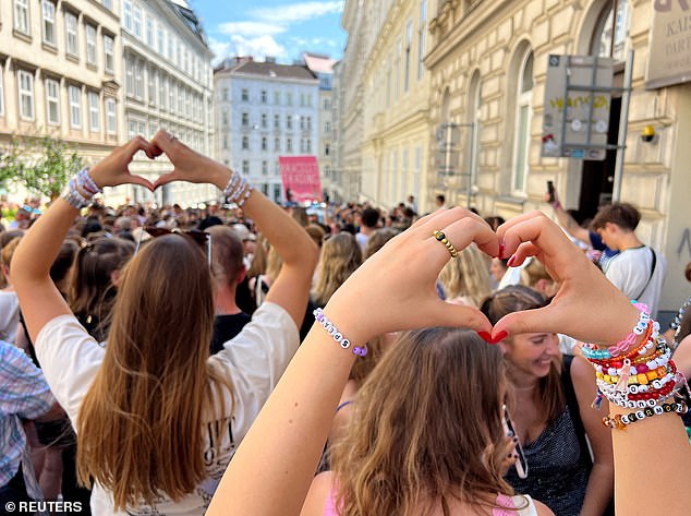 "swifts" gather in Vienna at Corneliusgasse, after the government confirmed a planned attack there and Taylor Swift's concerts in Vienna were cancelled