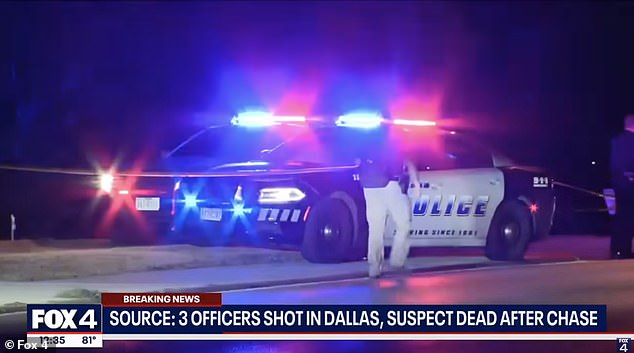 Police responded to a call for assistance from an officer shortly after 10 p.m. Thursday in the 900 block of East Ledbetter Drive and found an injured officer in a patrol car, the Dallas Police Department said in a statement. Pictured: A view of the scene as broadcast by Fox 4 News