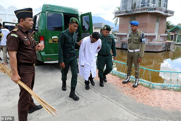 Victims are taken from prison vans to receive their punishments on August 30, 2024