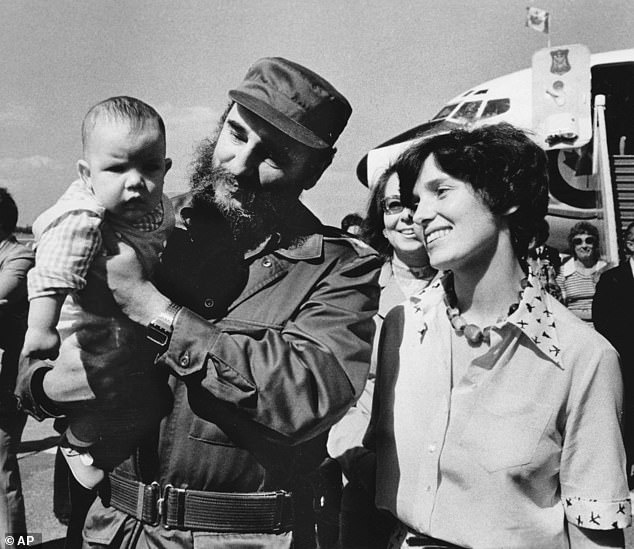 Margaret Trudeau smiles as Cuban President Fidel Castro holds her youngest son, Michel, after the Trudeaus arrived in Havana, Cuba, in 1976.