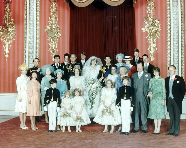 Lord Fellowes is pictured (back right) at the wedding of Prince Charles and Diana in 1981.