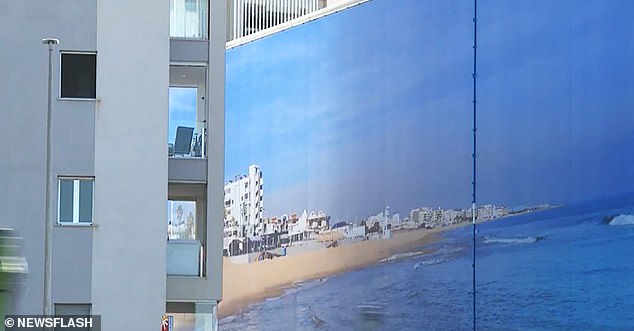 The image shows the giant canvas replacing the sea view in Torrevieja, Spain, undated.