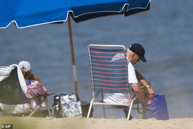 The outspoken Republican, 50, shared images of Biden lounging on the beach, taken on August 28.