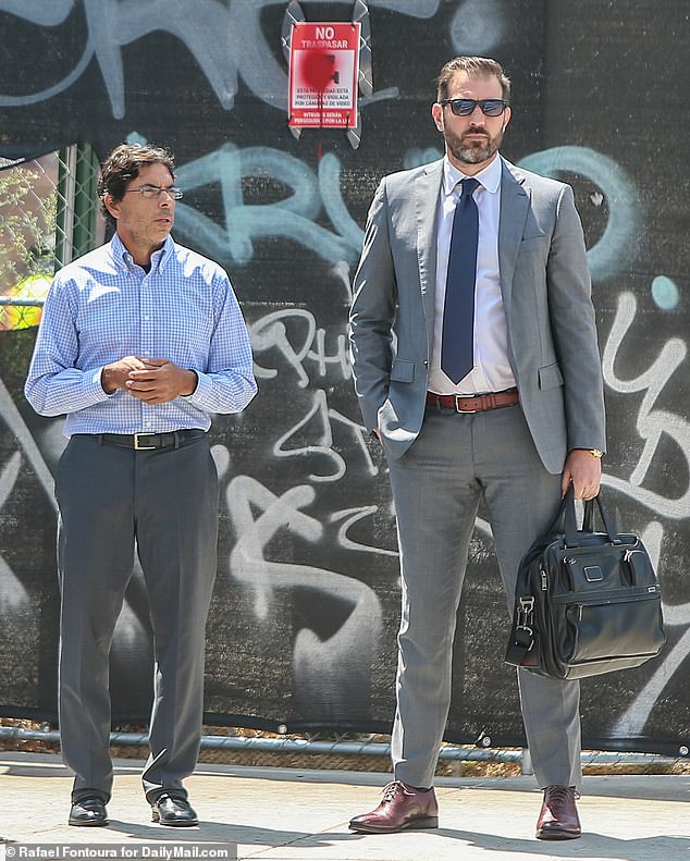 Chavez and his attorney Matthew C. Binninger outside federal court on Friday