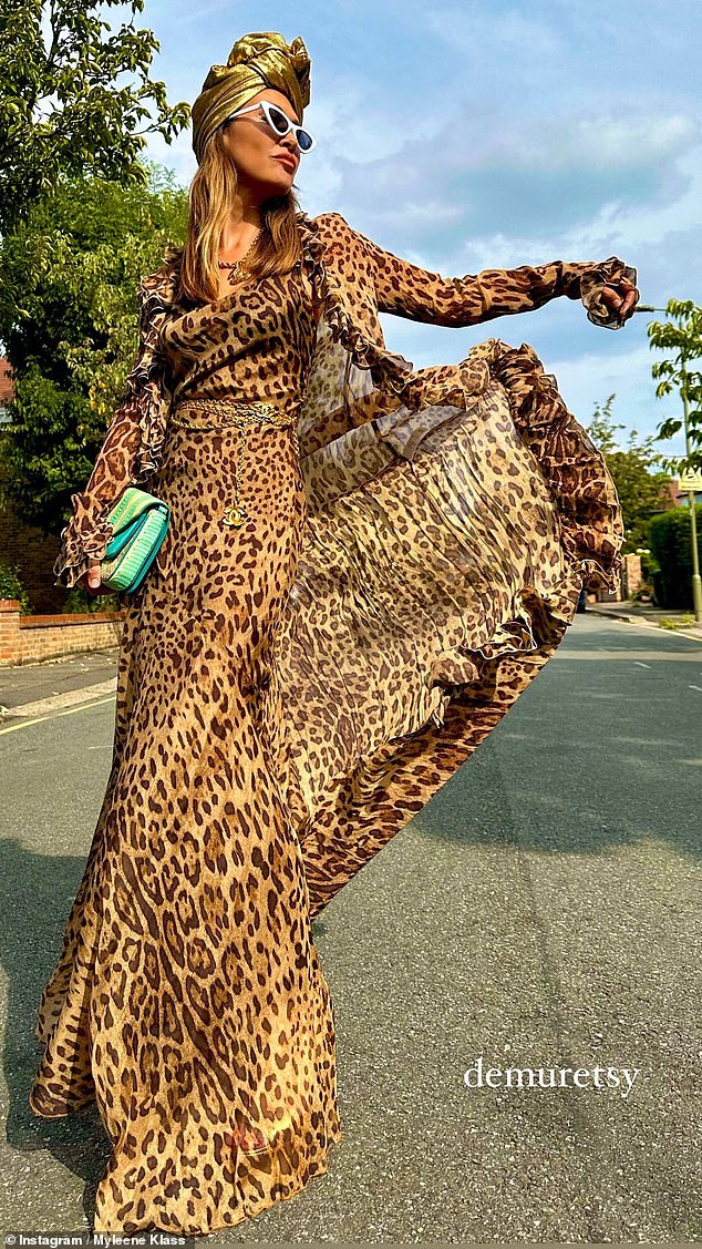 The former Hear'Say singer, 46, radiated confidence in a leopard-print maxi dress as she showed off her enviable figure and posed playfully for photos.