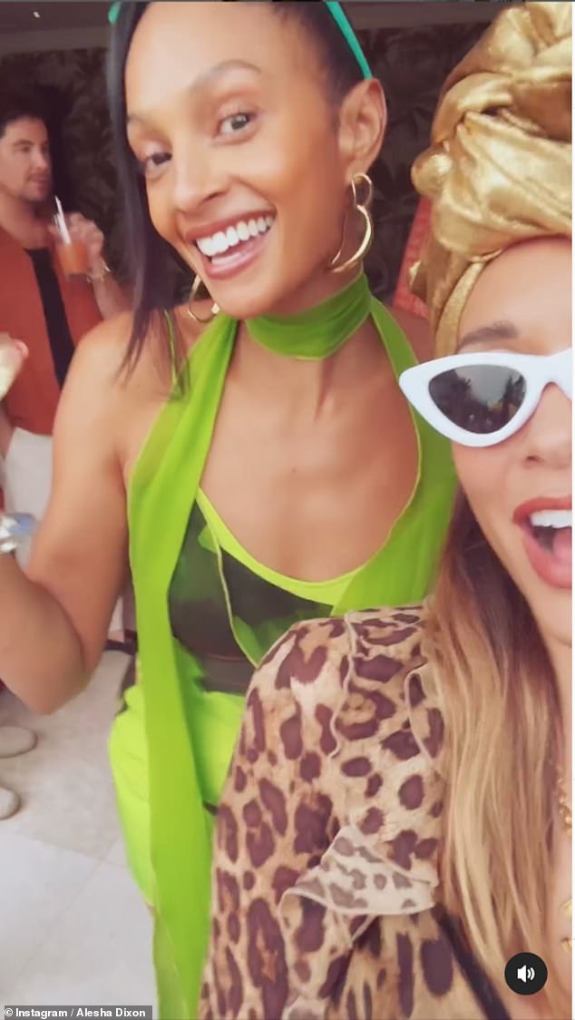 Alesha made sure everyone knew she was enjoying her childhood summer as she attended the party in a green dress with a long tie, statement earrings and green sunglasses.