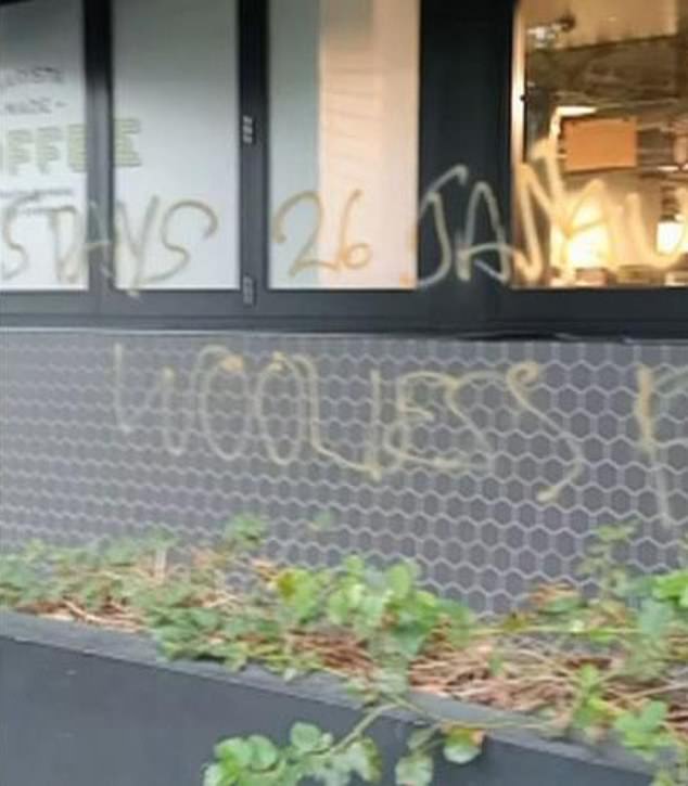 The chain's decision to remove Australia Day merchandise on January 26 sparked an uproar among shoppers and at least one store was sprayed with graffiti (pictured)