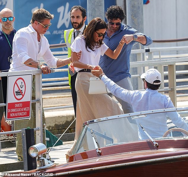 Meanwhile, Ines, 34, who has been dating the Hollywood heavyweight since late 2022, looked effortlessly chic in a high-waisted beige skirt and white top.