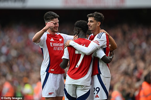 Kai Havertz (right) put the hosts ahead after a fine move from Bukayo Saka (centre)