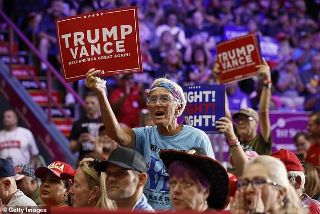 Supporters cheer the Republican presidential candidate during a campaign rally at the 1st Summit Arena at the Cambria County War Memorial on August 30.