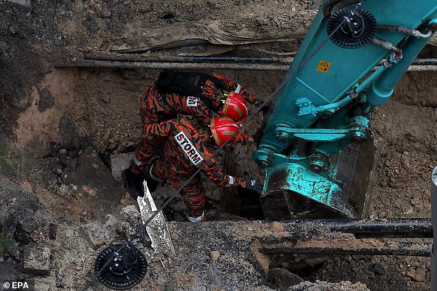 Excavators were later photographed at the site, while rescuers brought in sniffer dogs and robotic cameras to explore the underground network.